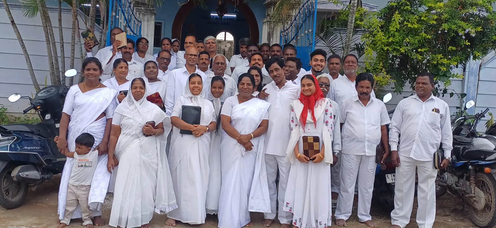 The HVCT network of village pastors gathered outside the church